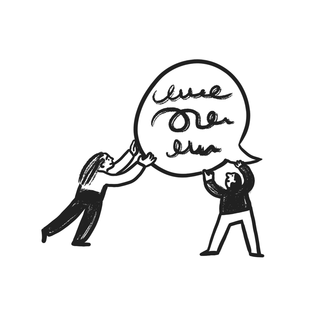 Two people holding a speech bubble together